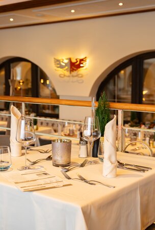 Gedeckte Tische im Restaurant Hotel Tyrol am Haldensee