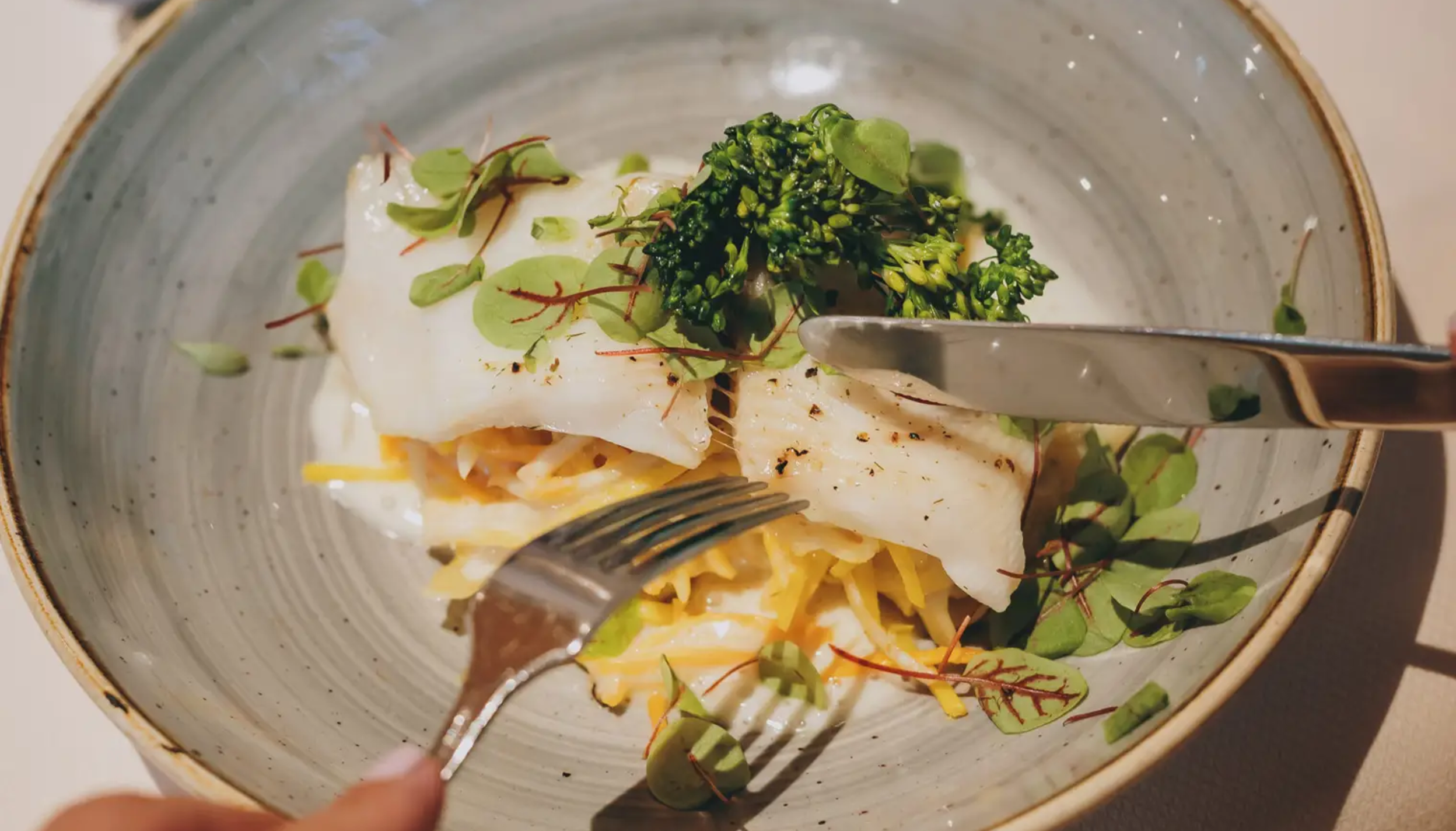 Fischgericht im Hotel Tyrol am Haldensee wird gegessen